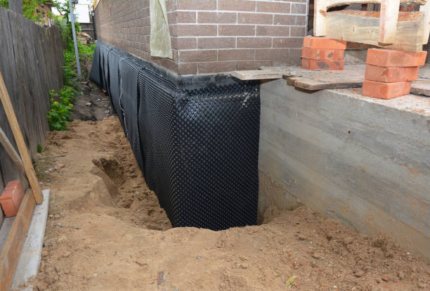 Happy homeowners after waterproofing job in Mexico